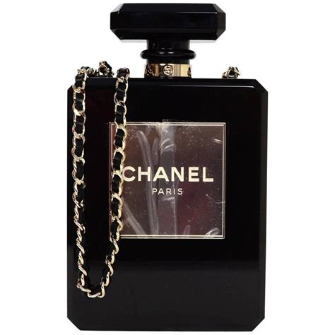 chanel resort 14 runway black plexiglass perfume bottle bag|Need It Now: Chanel No.5 Perfume Bottle Clutch .